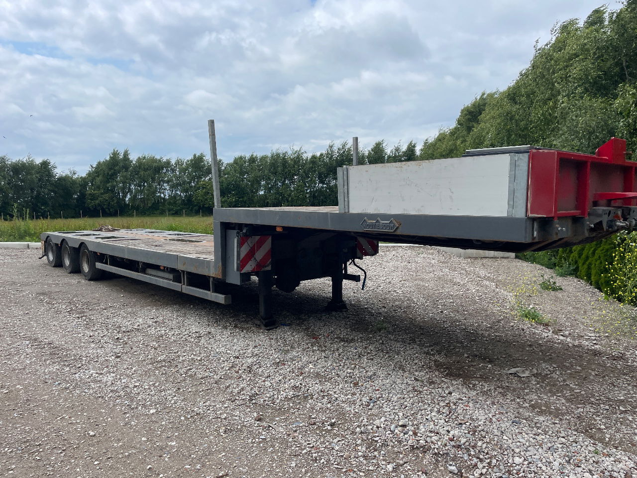 Nooteboom Mco-48-03 V uitschuifbaar hydrolisch gestuurd semi dieplader - عربة مسطحة منخفضة نصف مقطورة: صور 1 Nooteboom Mco-48-03 V uitschuifbaar hydrolisch gestuurd semi dieplader - عربة مسطحة منخفضة نصف مقطورة: صور 1