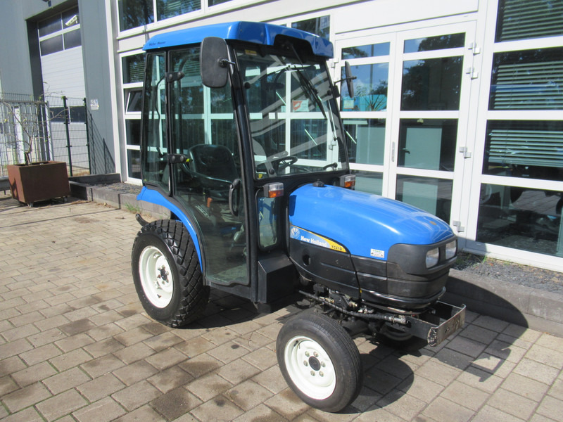 New Holland TC21D 4WD 4x4 Cabine Verwarming - جرار: صور 5 New Holland TC21D 4WD 4x4 Cabine Verwarming - جرار: صور 5