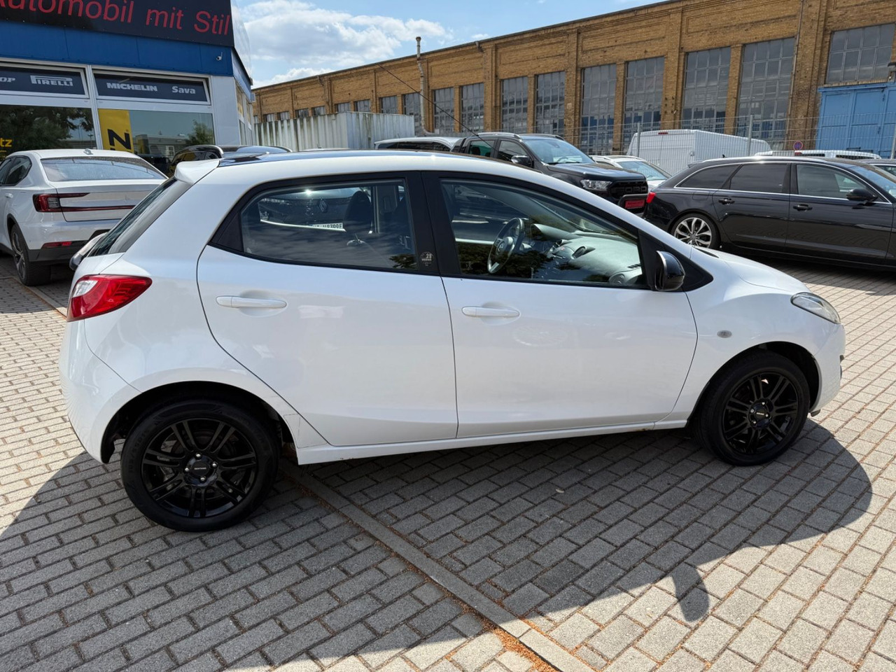 Mazda 2 Lim. 1.3 Origami 5 TÜER KLIMA SHZ TÜV NEU - سيارة: صور 3 Mazda 2 Lim. 1.3 Origami 5 TÜER KLIMA SHZ TÜV NEU - سيارة: صور 3