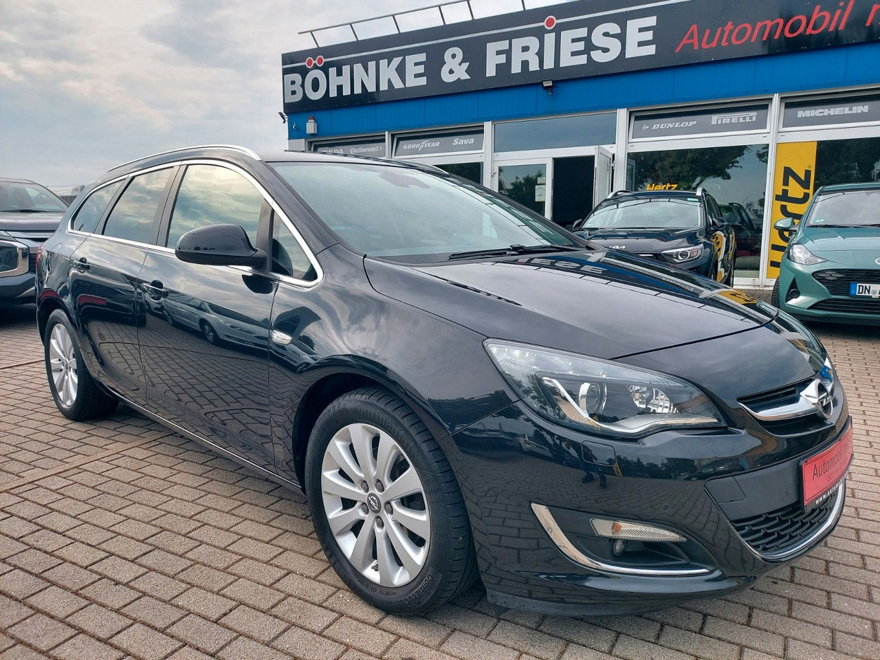 Opel Astra J Sports Tourer Exklusiv Navi Xenon AHK - سيارة: صور 1 Opel Astra J Sports Tourer Exklusiv Navi Xenon AHK - سيارة: صور 1