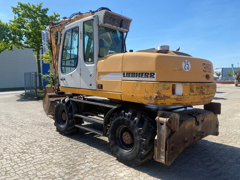 Liebherr A316 Litronic NVT - حفارة على عجلات: صور 1 Liebherr A316 Litronic NVT - حفارة على عجلات: صور 1