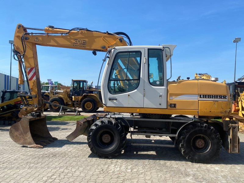Liebherr A316 Litronic NVT - حفارة على عجلات: صور 2 Liebherr A316 Litronic NVT - حفارة على عجلات: صور 2