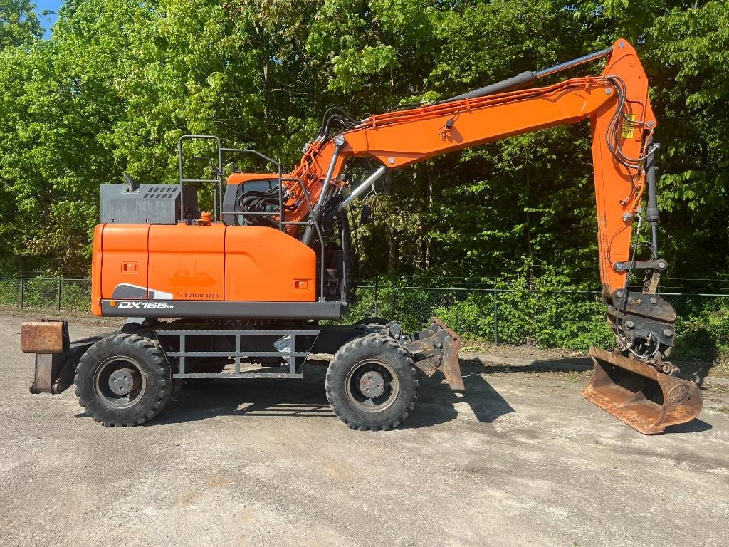 Doosan DX 165 W-5 - حفارة على عجلات: صور 5 Doosan DX 165 W-5 - حفارة على عجلات: صور 5