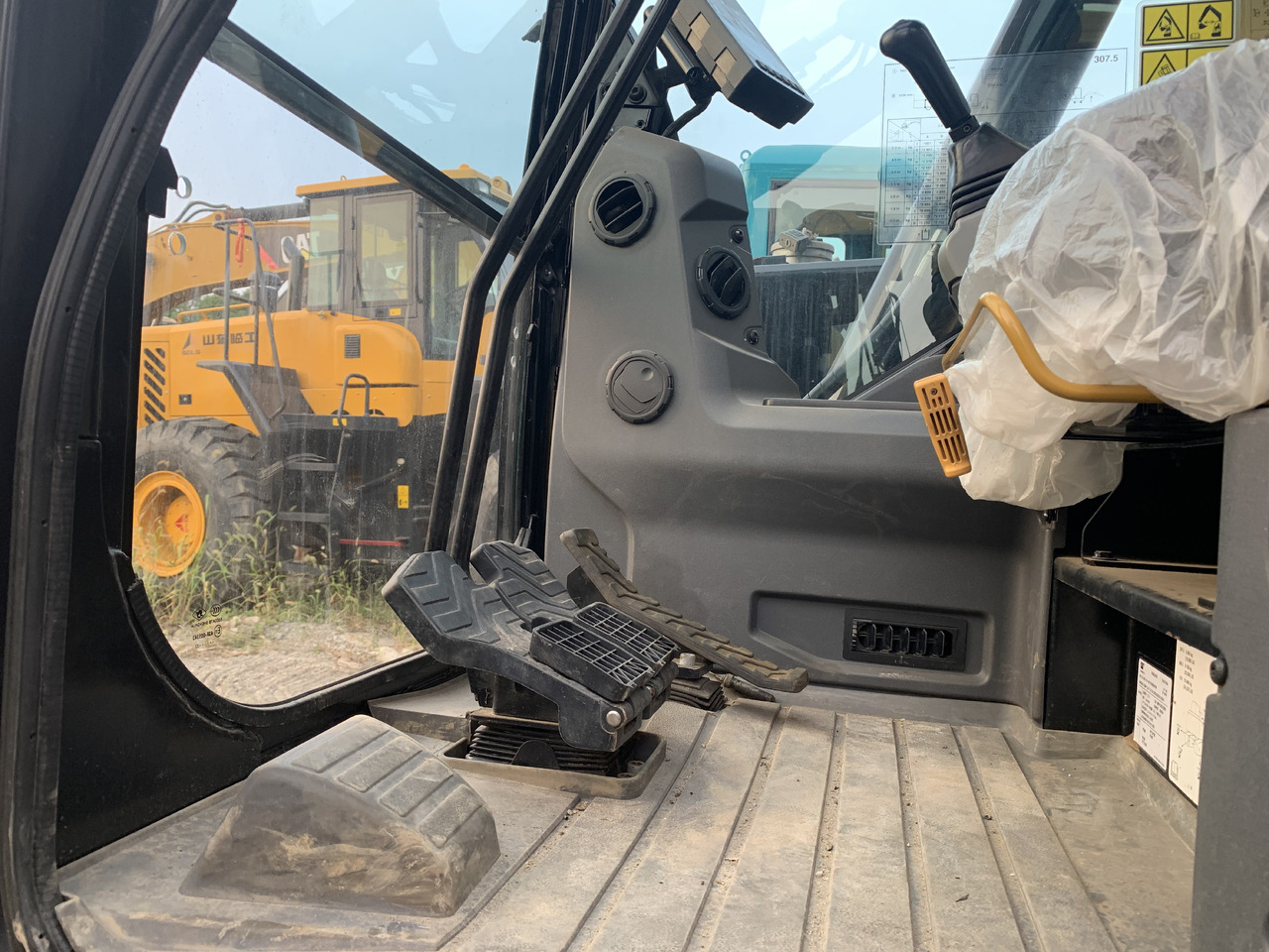 CATERPILLAR 307.5 - حفارة على عجلات: صور 5 CATERPILLAR 307.5 - حفارة على عجلات: صور 5
