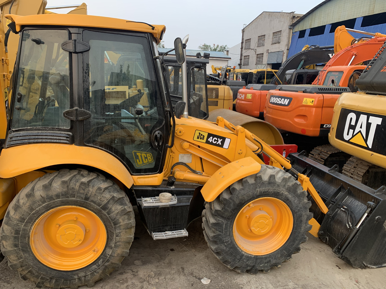 JCB 4CX - اللودر بعجل: صور 1 JCB 4CX - اللودر بعجل: صور 1