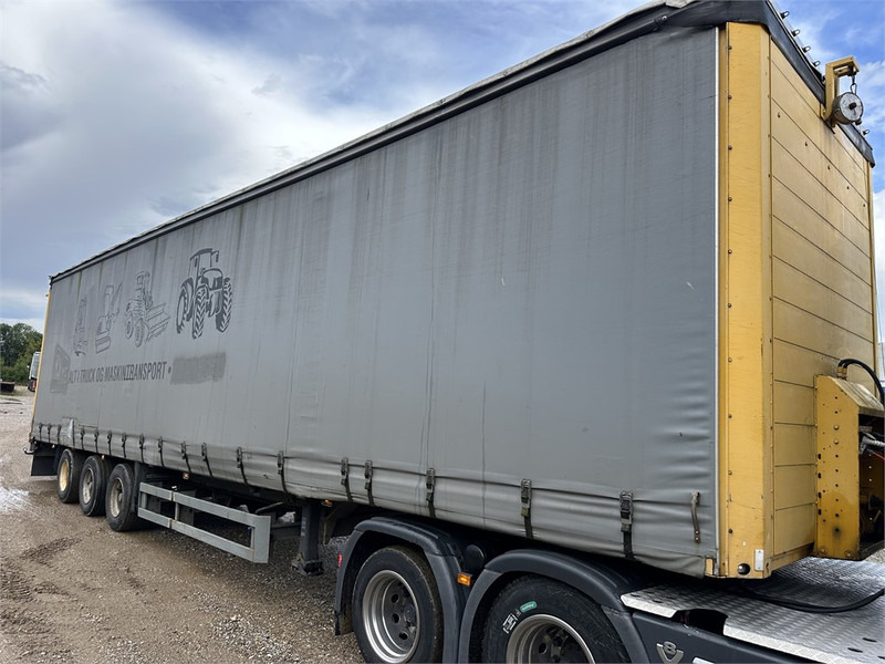 Schmitz Cargobull Machine transport trailer with bag ramp - عربة مسطحة منخفضة نصف مقطورة: صور 4 Schmitz Cargobull Machine transport trailer with bag ramp - عربة مسطحة منخفضة نصف مقطورة: صور 4