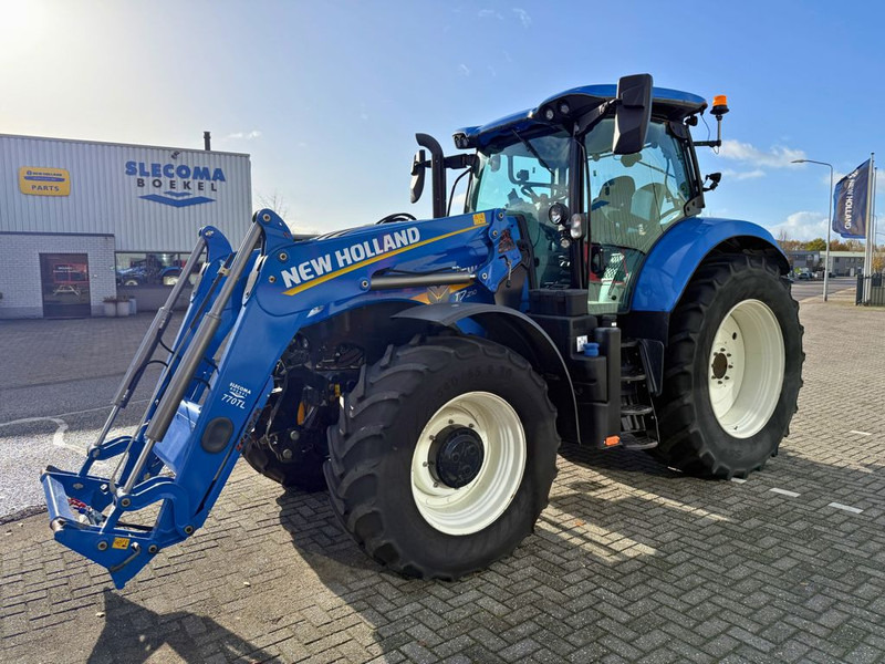 New Holland T7.210 AC Stage V + TL770 Voorlader - جرار: صور 1 New Holland T7.210 AC Stage V + TL770 Voorlader - جرار: صور 1