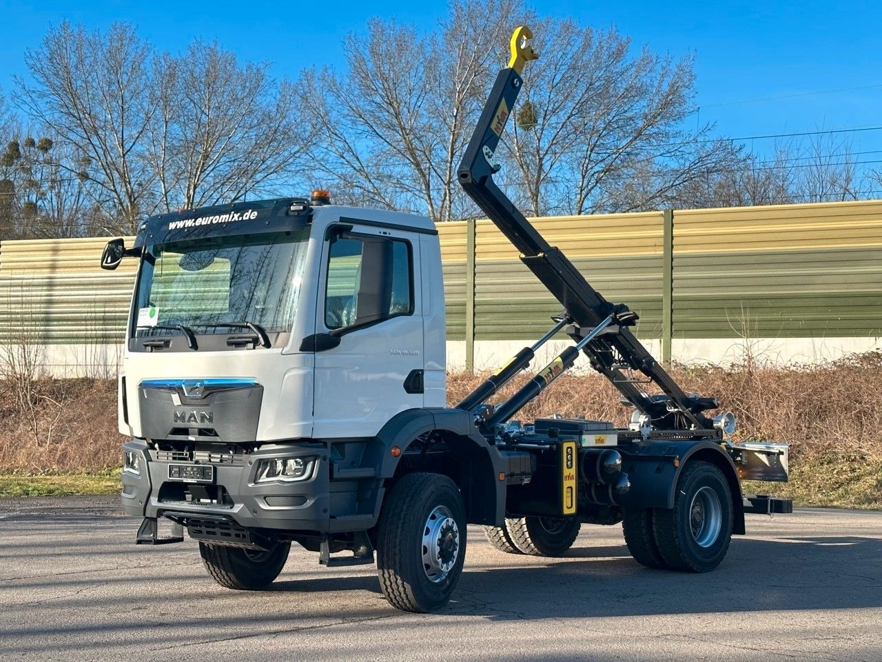 MAN TGM 18.320 4x4 Euro 6e Hyva 12-45 - شاحنة ذات الخطاف, شاحنة كرين: صور 1 MAN TGM 18.320 4x4 Euro 6e Hyva 12-45 - شاحنة ذات الخطاف, شاحنة كرين: صور 1