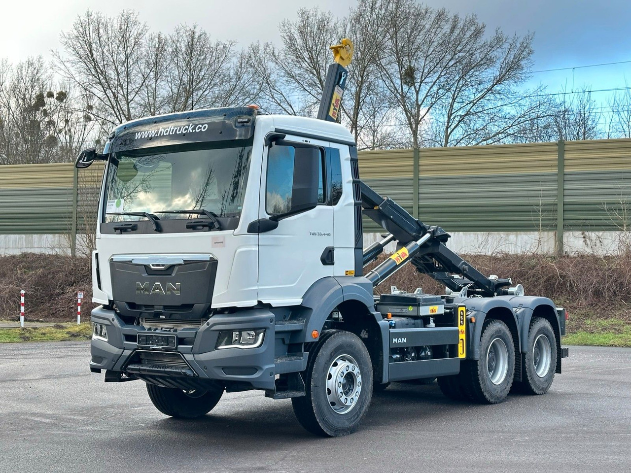 MAN TGS 33.440 6x4 Euro6e Abrollkipper Hyva - شاحنة ذات الخطاف, شاحنة كرين: صور 1 MAN TGS 33.440 6x4 Euro6e Abrollkipper Hyva - شاحنة ذات الخطاف, شاحنة كرين: صور 1