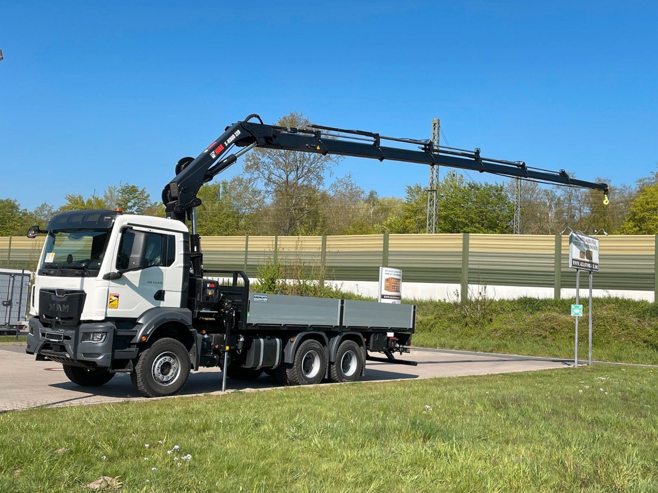 MAN TGS 33.440 6x4 HIAB 228-6 - شاحنات مسطحة, شاحنة كرين: صور 1 MAN TGS 33.440 6x4 HIAB 228-6 - شاحنات مسطحة, شاحنة كرين: صور 1