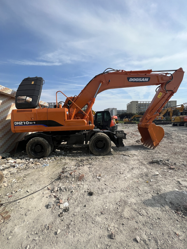 DOOSAN DX210 - حفارة على عجلات: صور 2 DOOSAN DX210 - حفارة على عجلات: صور 2