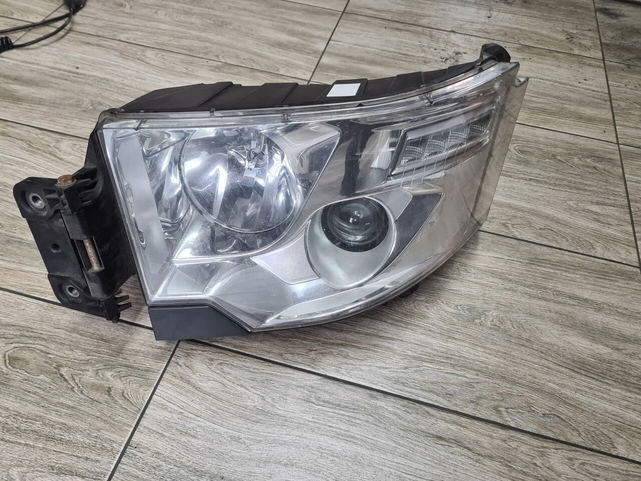 RENAULT LAMPA LEWA REFLEKTOR H7 RENAULT GAMA T RANGE ORYGINAŁ - كشافات - شاحنة: صور 1 RENAULT LAMPA LEWA REFLEKTOR H7 RENAULT GAMA T RANGE ORYGINAŁ - كشافات - شاحنة: صور 1