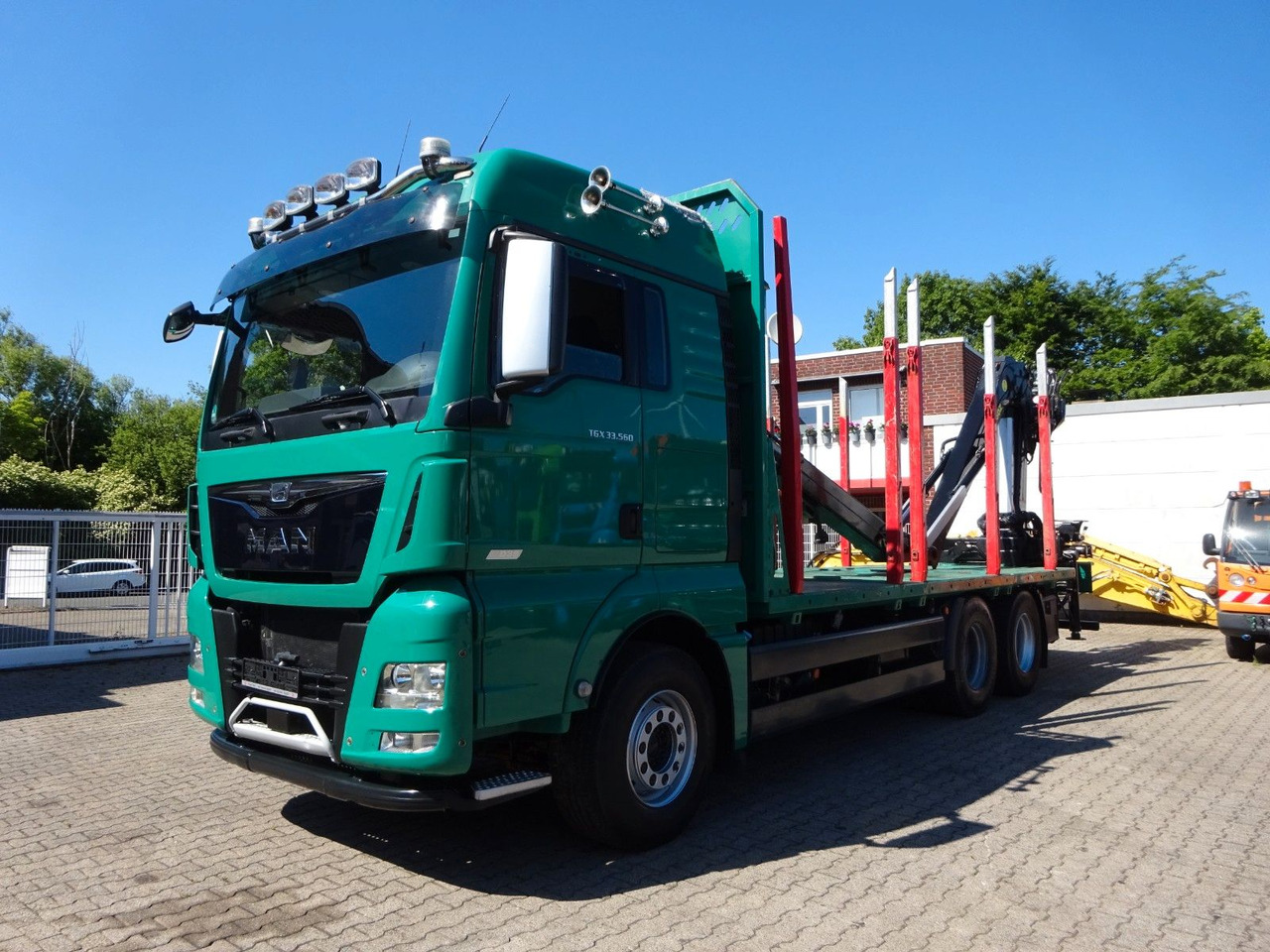 MAN 33.560 TGX mit TAJFUN L150Z Holzladekran 6x4 - شاحنة قطع الأشجار, شاحنة كرين: صور 2 MAN 33.560 TGX mit TAJFUN L150Z Holzladekran 6x4 - شاحنة قطع الأشجار, شاحنة كرين: صور 2