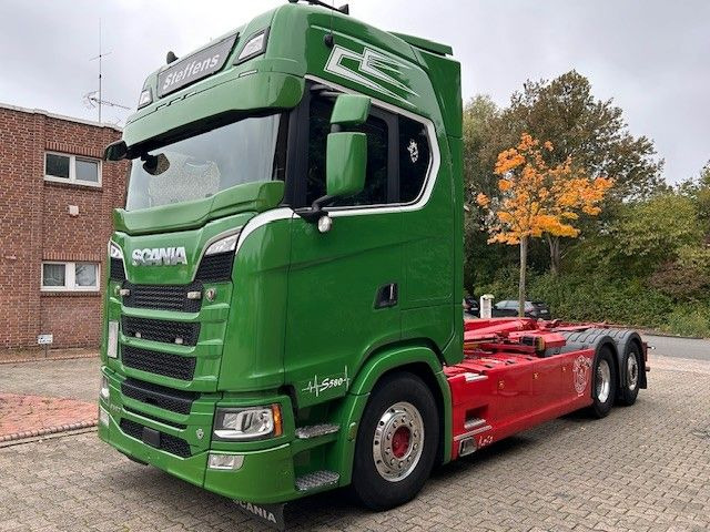 Scania S580 V8 MEILLER Abroller mit Lift+Lenkachse 6x2 - شاحنة ذات الخطاف: صور 1 Scania S580 V8 MEILLER Abroller mit Lift+Lenkachse 6x2 - شاحنة ذات الخطاف: صور 1