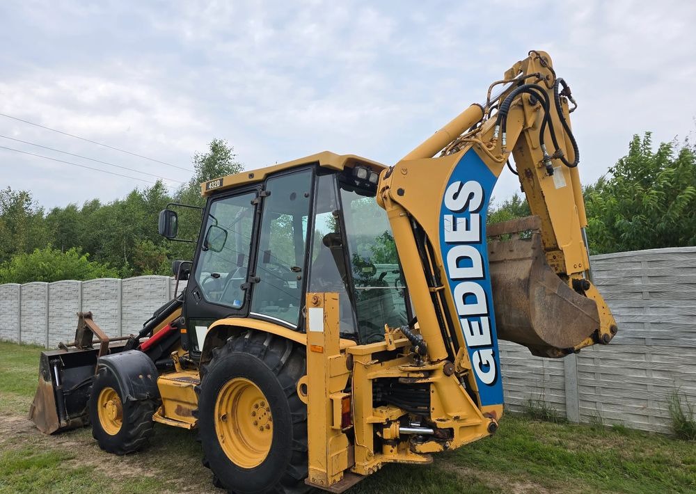 حفار متعدد الاستخدام Caterpillar: صور 8