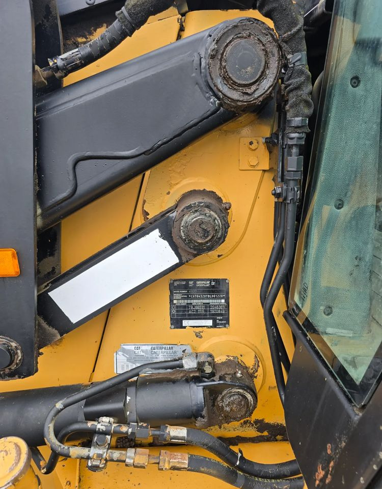 حفار متعدد الاستخدام Caterpillar: صور 7