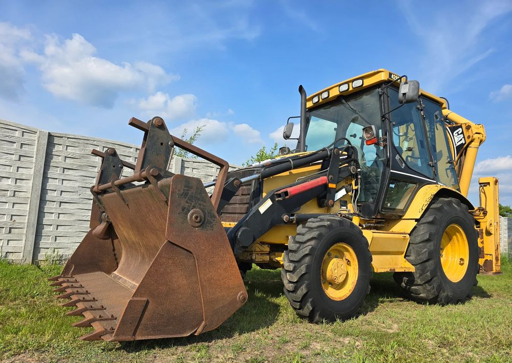 Caterpillar - حفار متعدد الاستخدام: صور 1 Caterpillar - حفار متعدد الاستخدام: صور 1