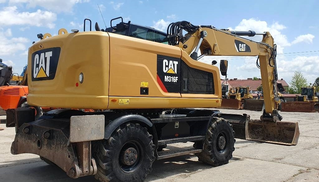 CAT M316F - حفارة على عجلات: صور 5 CAT M316F - حفارة على عجلات: صور 5