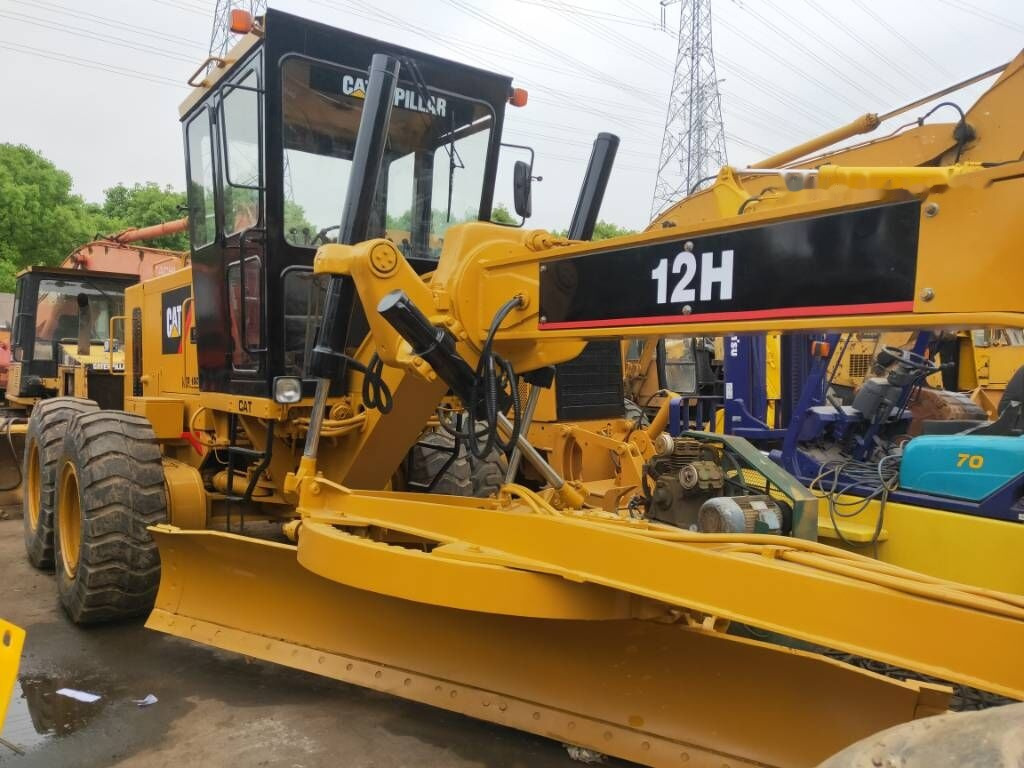 Caterpillar 12H - آلة تسوية الأرض: صور 2 Caterpillar 12H - آلة تسوية الأرض: صور 2
