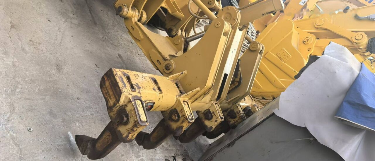 آلة تسوية الأرض Caterpillar 140H: صور 9