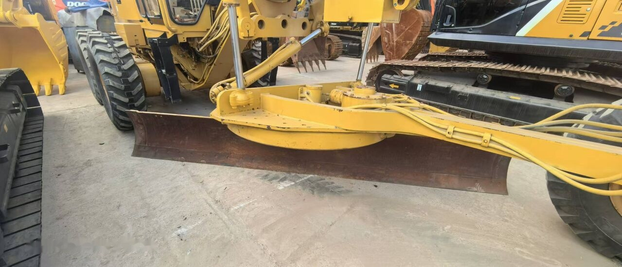 آلة تسوية الأرض Caterpillar 140H: صور 10