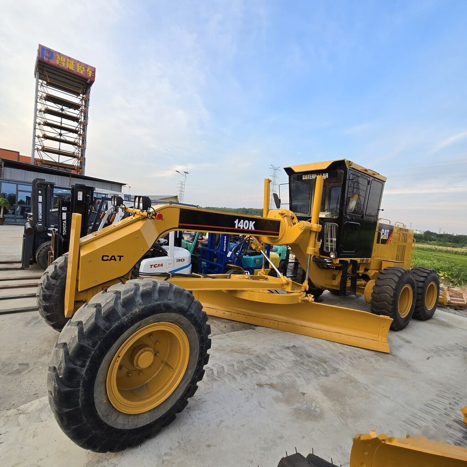 Caterpillar 140K - آلة تسوية الأرض: صور 1 Caterpillar 140K - آلة تسوية الأرض: صور 1