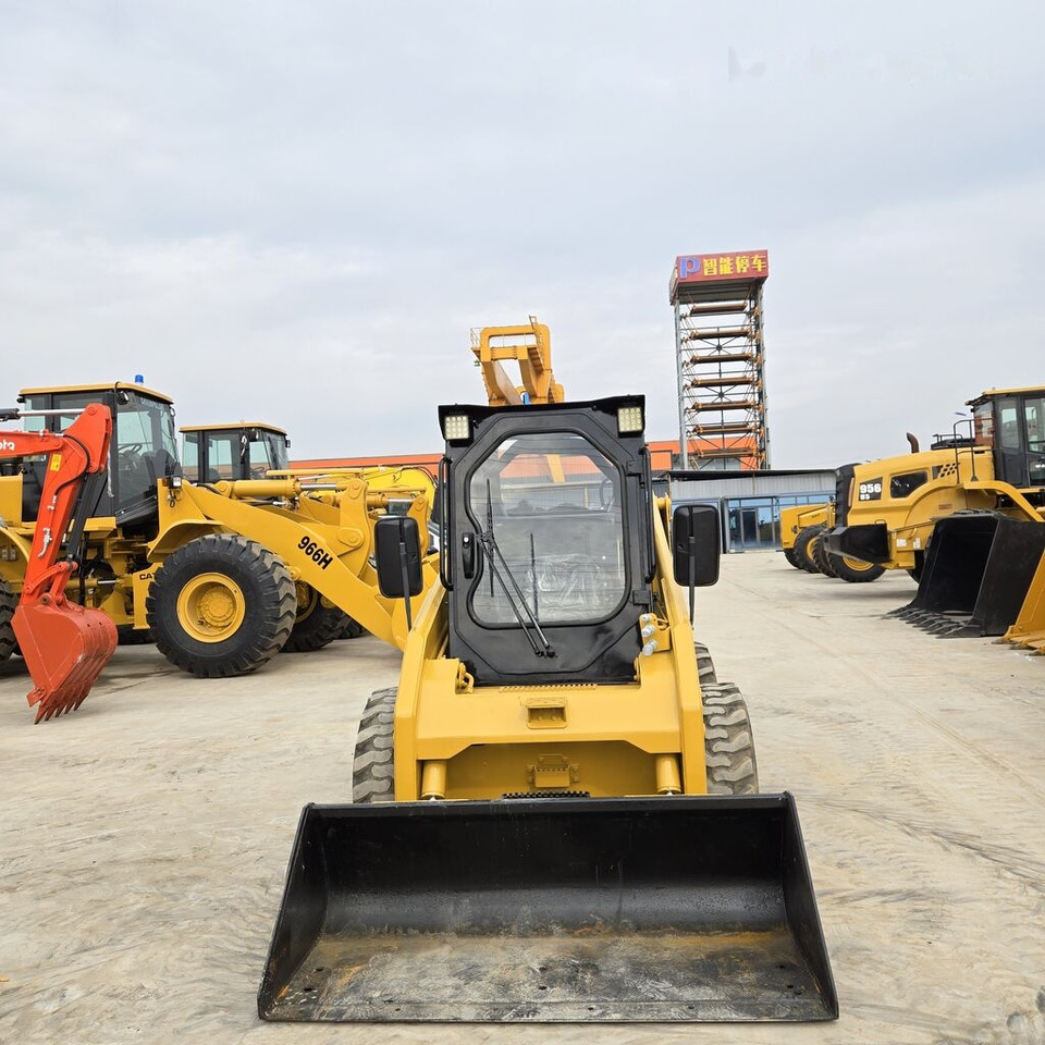 شيول صغير Caterpillar 246D: صور 6