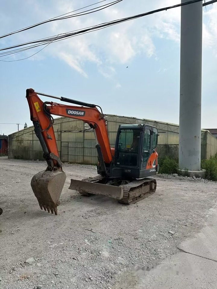 Doosan DX55 - حفارة مصغرة: صور 2 Doosan DX55 - حفارة مصغرة: صور 2