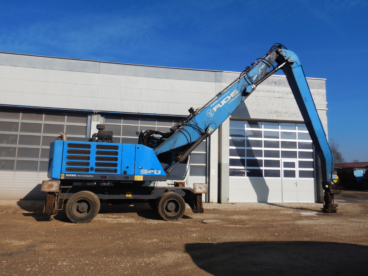 Fuchs MHL 340 F - حفارة النقل والشحن: صور 4 Fuchs MHL 340 F - حفارة النقل والشحن: صور 4