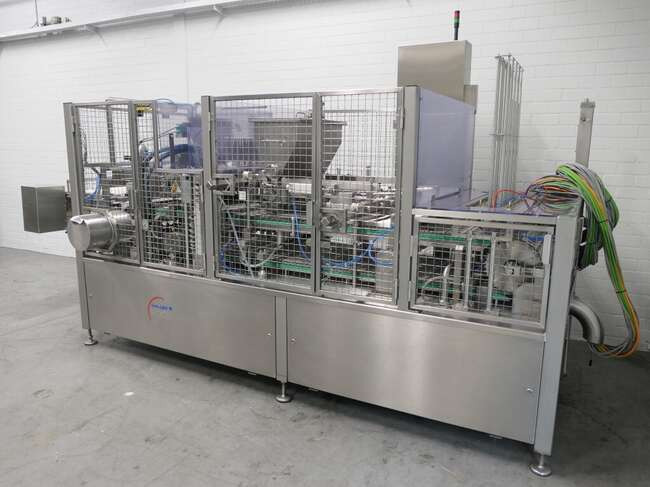 Grunwald filling- & closing machine Foodliner 12000/8 - آلة الغذاء: صور 2 Grunwald filling- & closing machine Foodliner 12000/8 - آلة الغذاء: صور 2