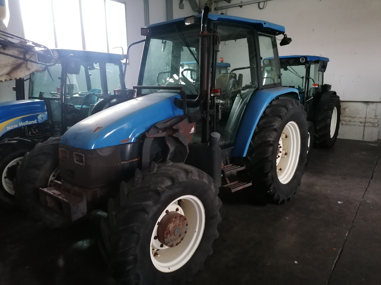 NEW HOLLAND TL 90 - جرار: صور 3 NEW HOLLAND TL 90 - جرار: صور 3