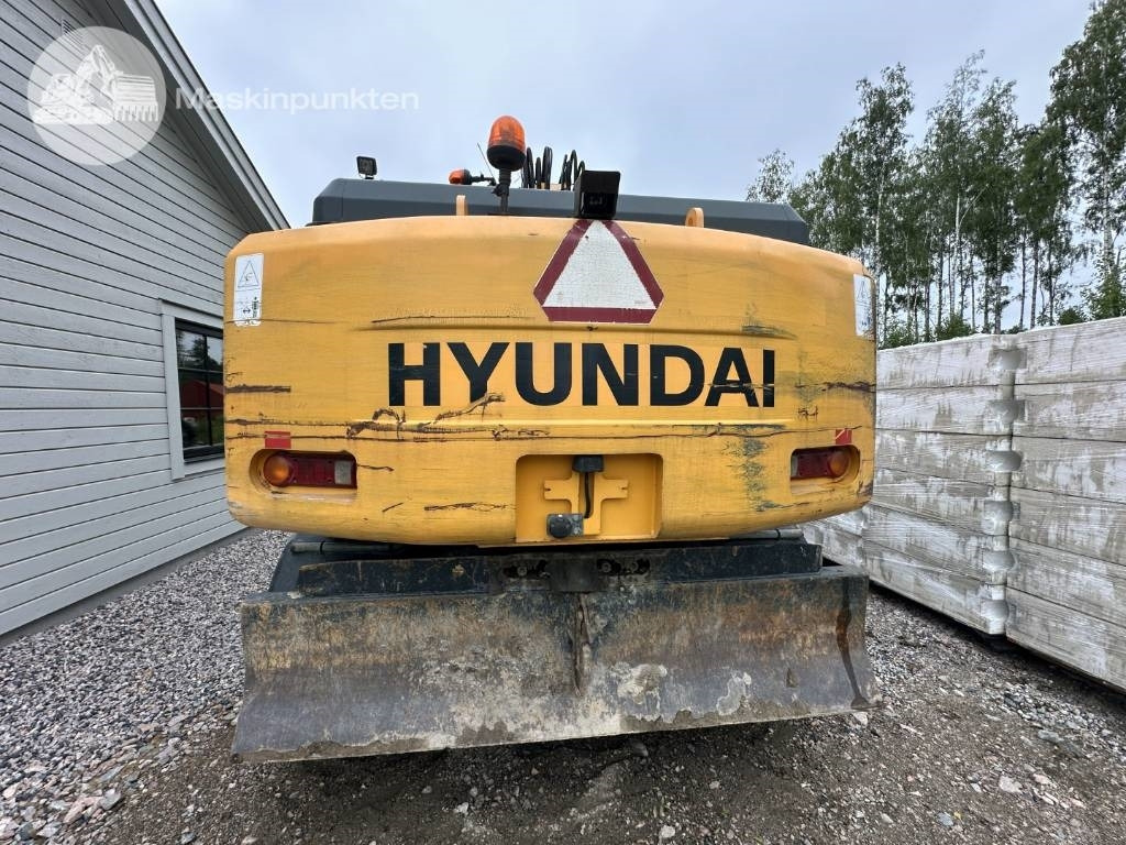 Hyundai Robex 140 W-7 A - حفارة على عجلات: صور 5 Hyundai Robex 140 W-7 A - حفارة على عجلات: صور 5