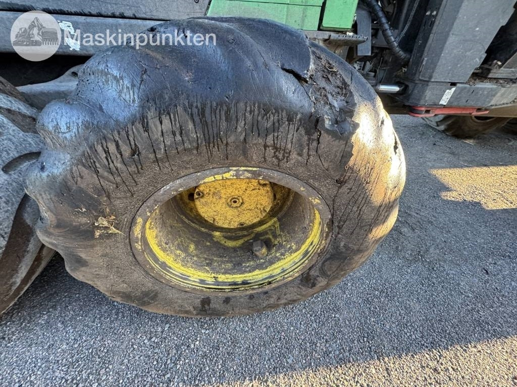 شاحنات نقل الأخشاب في الغابات John Deere 1510 E: صور 9