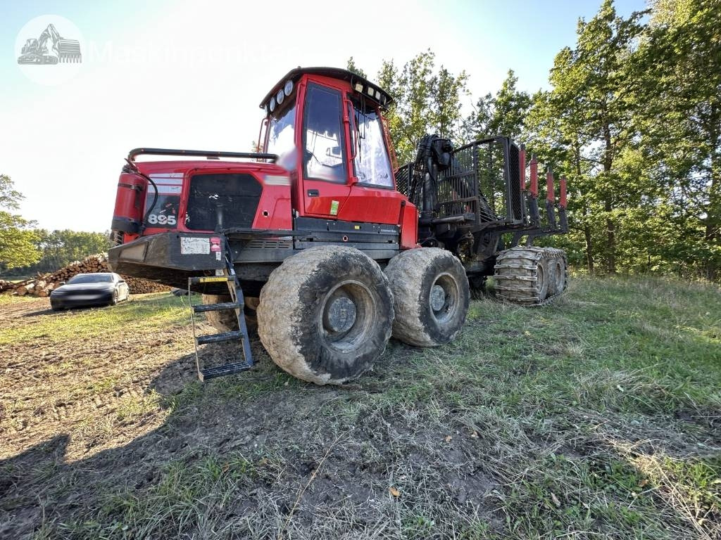 Komatsu 895 - شاحنات نقل الأخشاب في الغابات: صور 1 Komatsu 895 - شاحنات نقل الأخشاب في الغابات: صور 1
