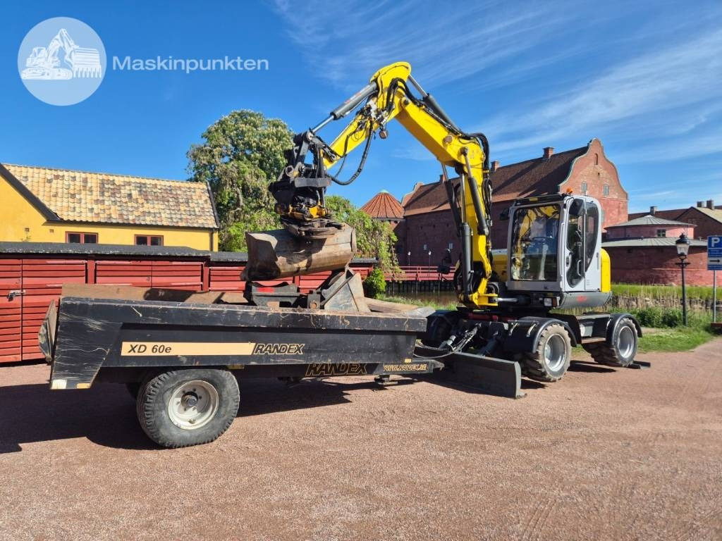 Wacker Neuson EW 100 med vagn  - حفارة على عجلات: صور 1 Wacker Neuson EW 100 med vagn  - حفارة على عجلات: صور 1
