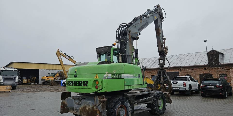 Koparka kołowa Liebherr A 316 Litronic chwytak podpory pług - حفارة على عجلات: صور 5 Koparka kołowa Liebherr A 316 Litronic chwytak podpory pług - حفارة على عجلات: صور 5