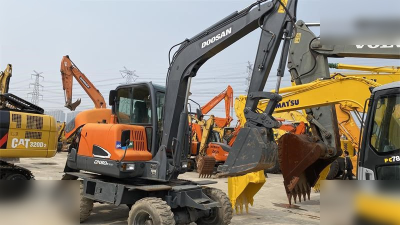 DOOSAN DX60W ECO - حفارة على عجلات: صور 3 DOOSAN DX60W ECO - حفارة على عجلات: صور 3