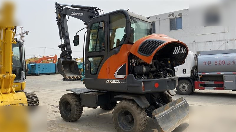 DOOSAN DX60W ECO - حفارة على عجلات: صور 4 DOOSAN DX60W ECO - حفارة على عجلات: صور 4
