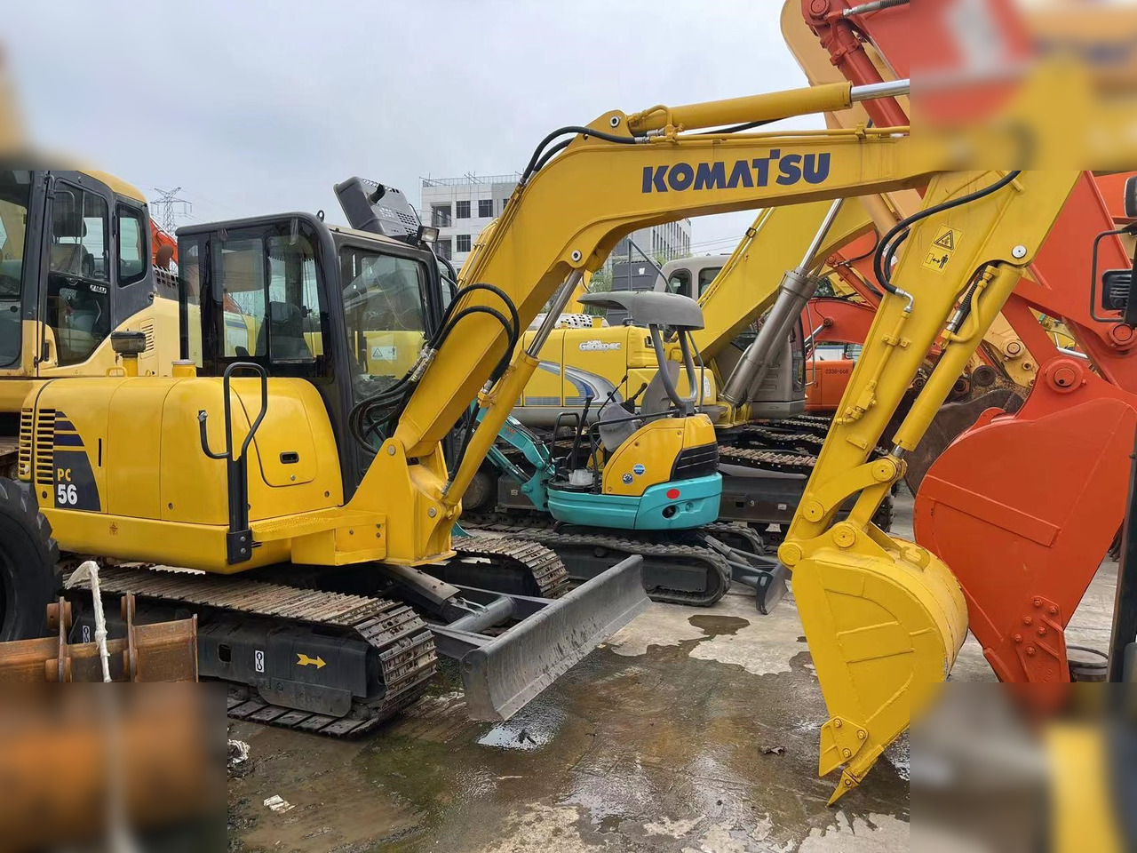 KOMATSU PC56-7 - حفارة مصغرة: صور 1 KOMATSU PC56-7 - حفارة مصغرة: صور 1