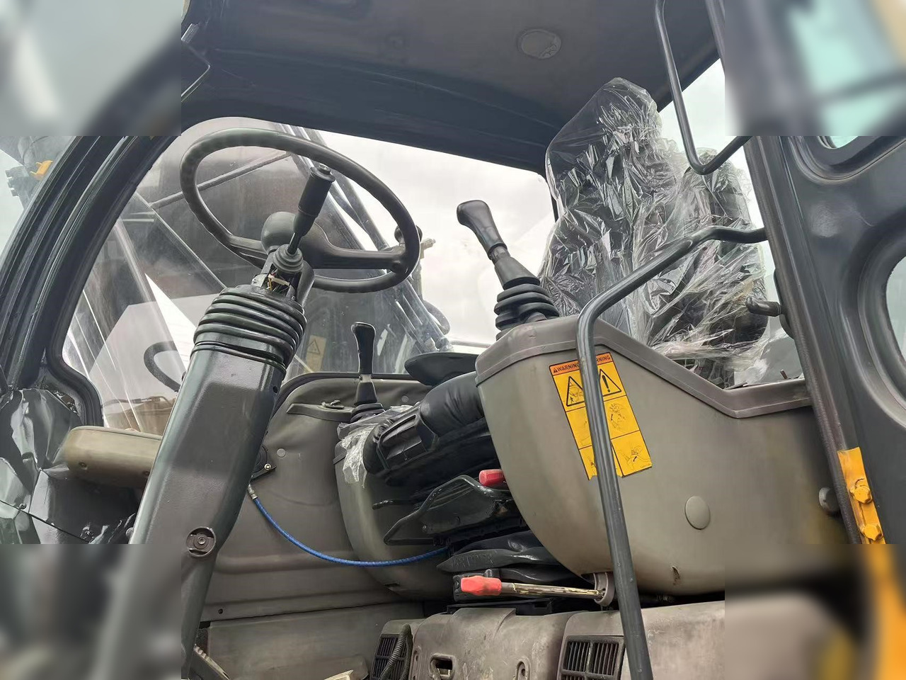 حفارة على عجلات VOLVO EW170: صور 10 حفارة على عجلات VOLVO EW170: صور 10