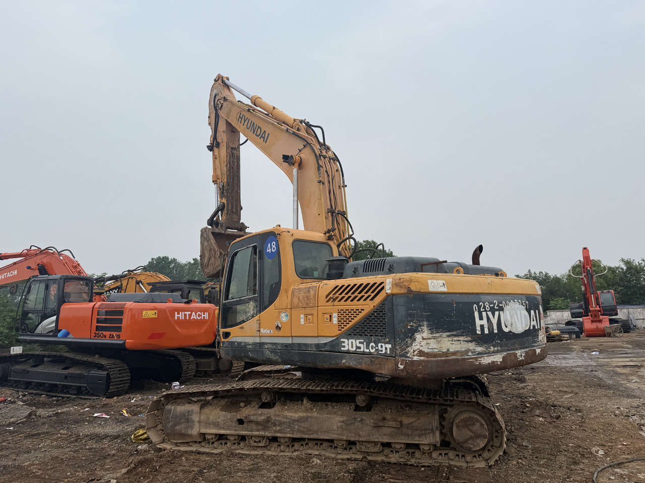 حفارات زحافة Hyundai 305-9t: صور 11