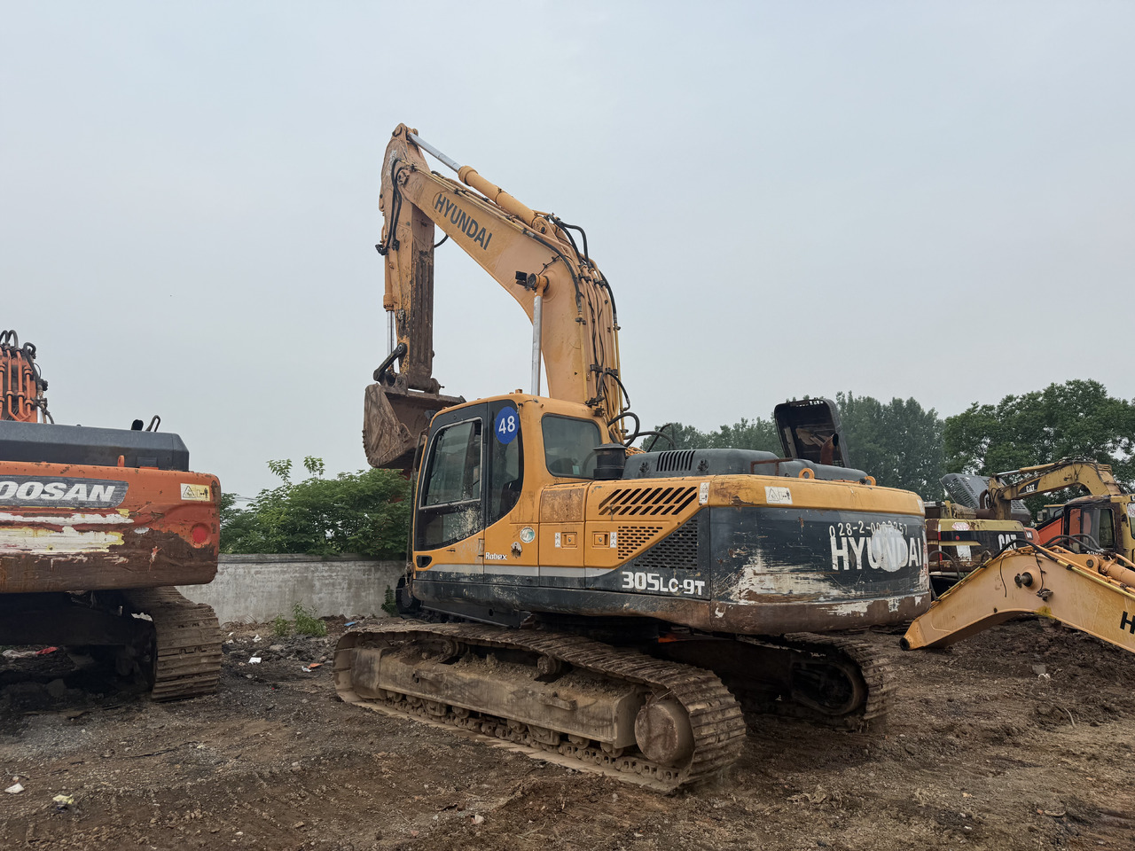حفارات زحافة Hyundai 305-9t: صور 12