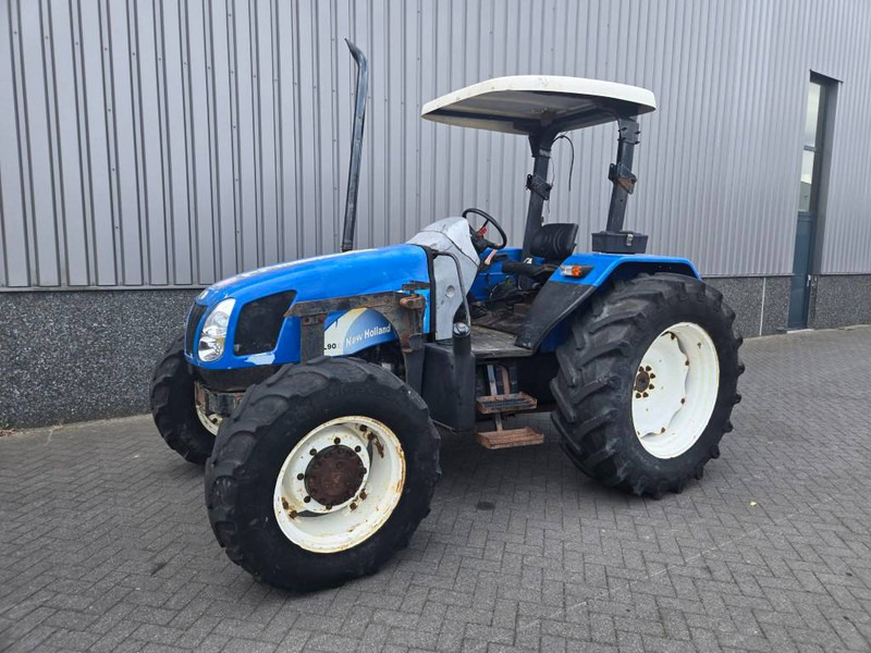 New Holland TL 90 A - جرار: صور 1 New Holland TL 90 A - جرار: صور 1
