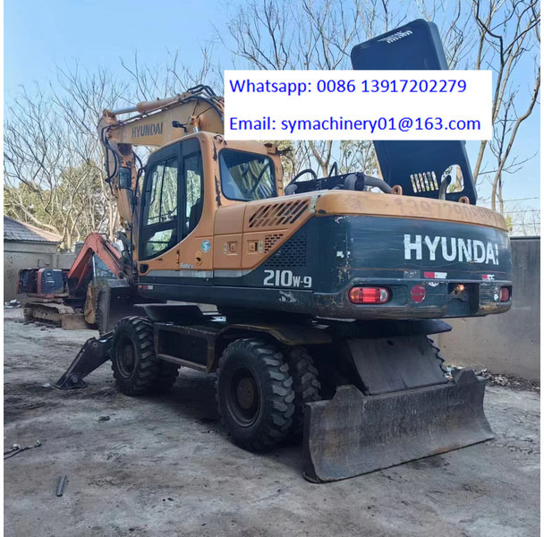 Hyundai R210W - حفارة على عجلات: صور 1 Hyundai R210W - حفارة على عجلات: صور 1