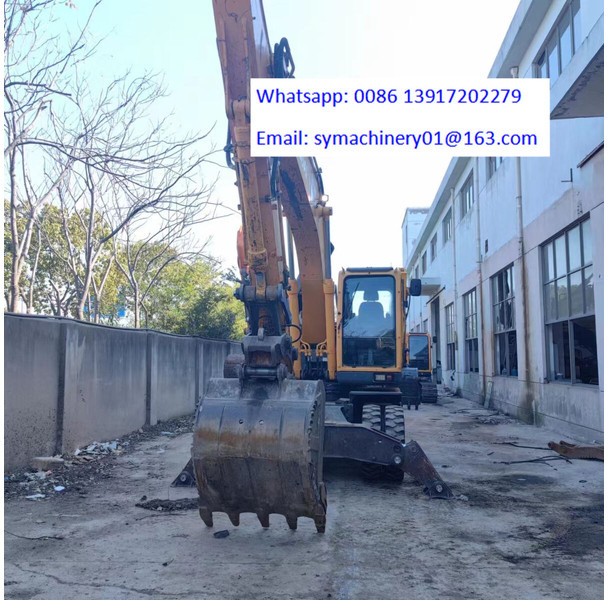 Hyundai R210W - حفارة على عجلات: صور 5 Hyundai R210W - حفارة على عجلات: صور 5