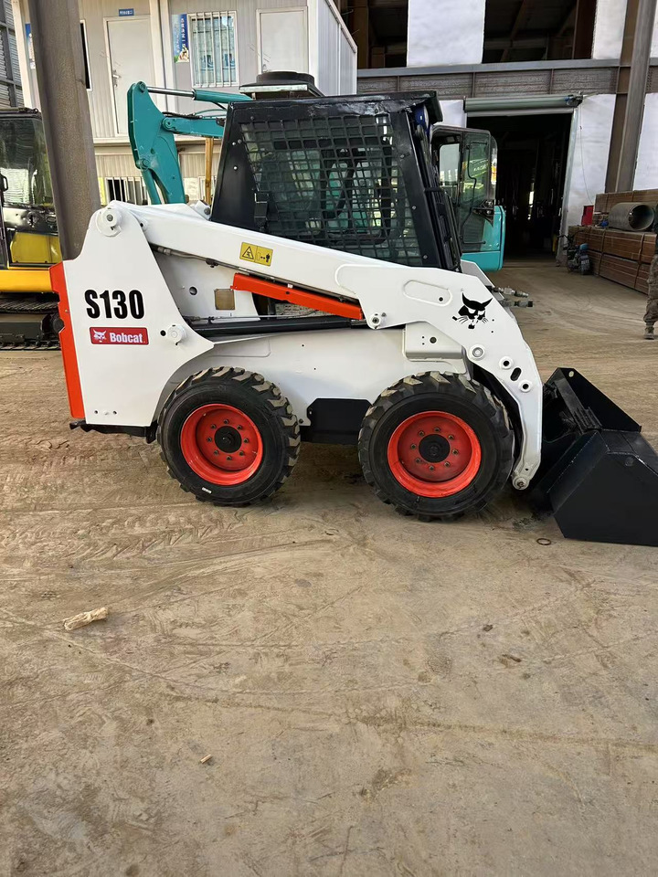 شيول صغير BOBCAT Skid Steer Loader S130: صور 9