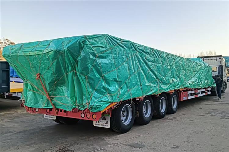 TITAN 4 Axle 100 Ton Low Bed Truck Trailer for Sale In Zambia - عربة مسطحة منخفضة نصف مقطورة: صور 1 TITAN 4 Axle 100 Ton Low Bed Truck Trailer for Sale In Zambia - عربة مسطحة منخفضة نصف مقطورة: صور 1