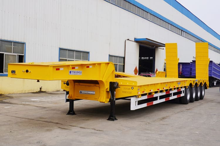 TITAN 4 Axle Lowbed Trailer Truck for Sale in Zambia - عربة مسطحة منخفضة نصف مقطورة: صور 1 TITAN 4 Axle Lowbed Trailer Truck for Sale in Zambia - عربة مسطحة منخفضة نصف مقطورة: صور 1
