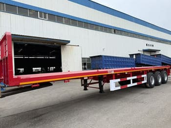 TITAN Flatbed Tri Axle Truck Trailer for Sale in Tanzania - نصف مقطورة مسطحة: صور 1 TITAN Flatbed Tri Axle Truck Trailer for Sale in Tanzania - نصف مقطورة مسطحة: صور 1