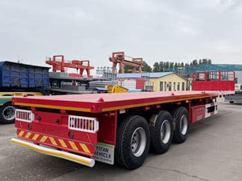 TITAN Flatbed Tri Axle Truck Trailer for Sale in Tanzania - نصف مقطورة مسطحة: صور 2 TITAN Flatbed Tri Axle Truck Trailer for Sale in Tanzania - نصف مقطورة مسطحة: صور 2